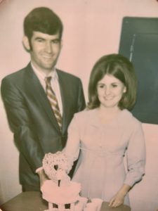 Debbie and Teddy Baremore Cutting wedding cake